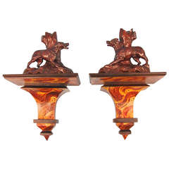 Pair of Carved Wooden Dogs on Later Faux-Grained Brackets
