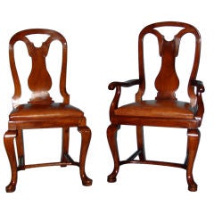 Important set of 12 Italian walnut dining chairs