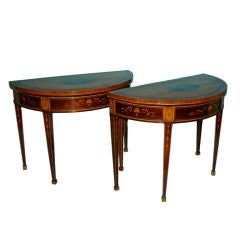A pair of beautifully inlaid Hepplewhite demi-lune tables