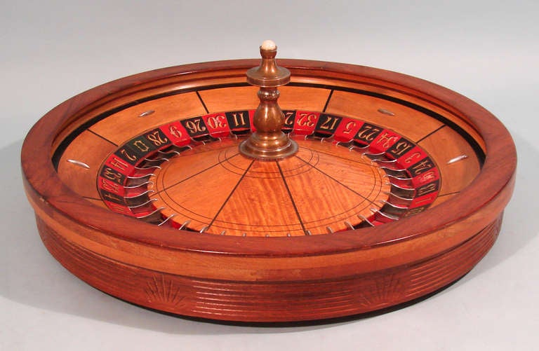 A good vintage roulette wheel of casino size and quality, the mechanism stamped by the maker, J.W. Sneed Long Beach, CA with the number 