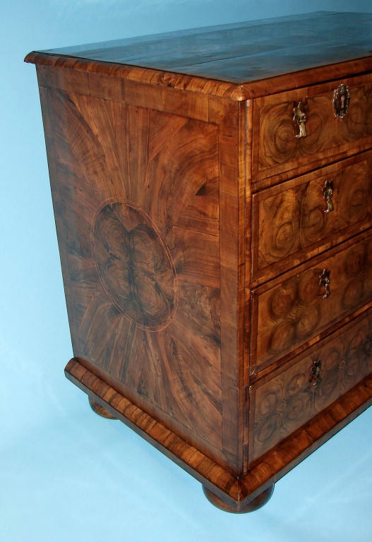English A fine William and Mary walnut oyster veneer chest of drawers
