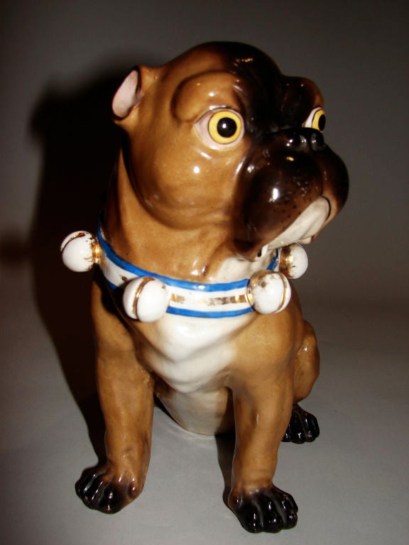 A pair of porcelain pug dogs 1