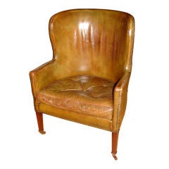 Antique English barrel back leather arm chair