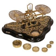Extraordinary cut and engraved brass  postal scale