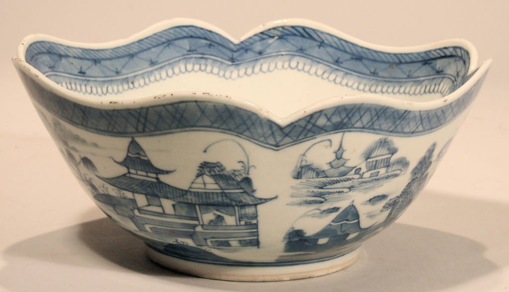 A Chinese export Canton blue and white porcelain bowl with scalloped edge, decorated in typical manner, circa 1860.