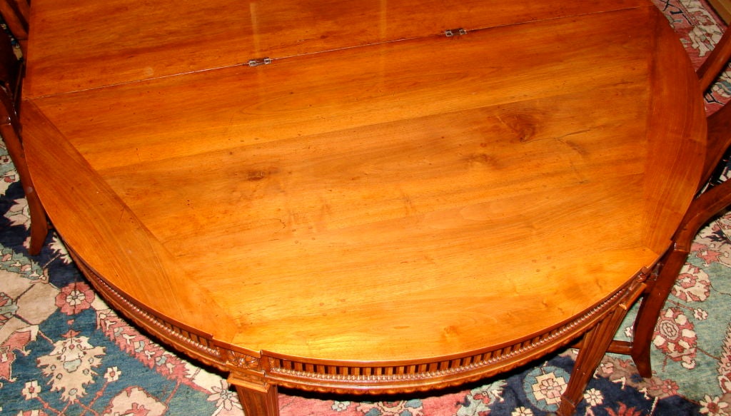 Elegant Louis XVI Walnut Extension Table with 6 Leaves