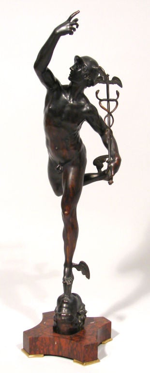 Bronze statue of Mercury on a marble stand