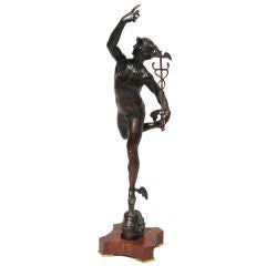 Antique Bronze statue of Mercury on a marble stand
