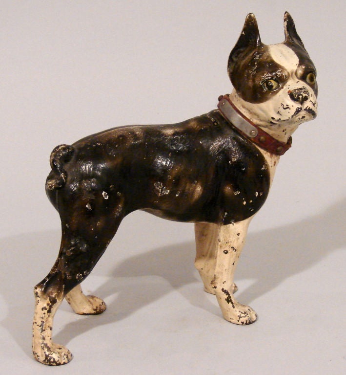 An American cast iron doorstop in the form of a Boston terrier circa 1900-1920.