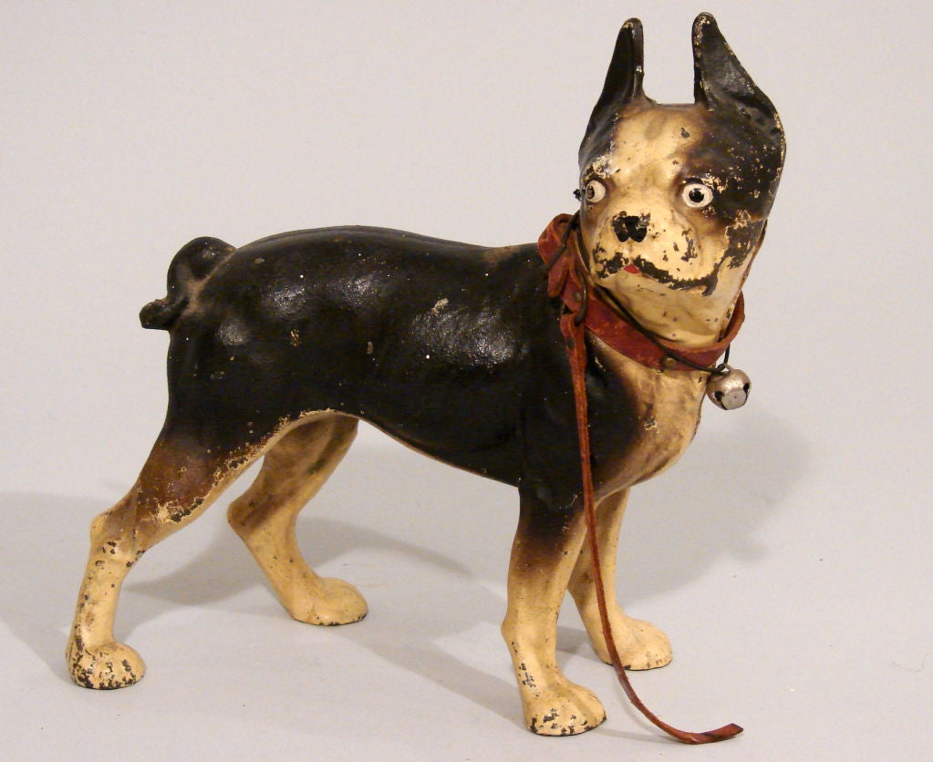 An American cast iron doorstop in the form of a Boston terrier, circa 1900-1920.