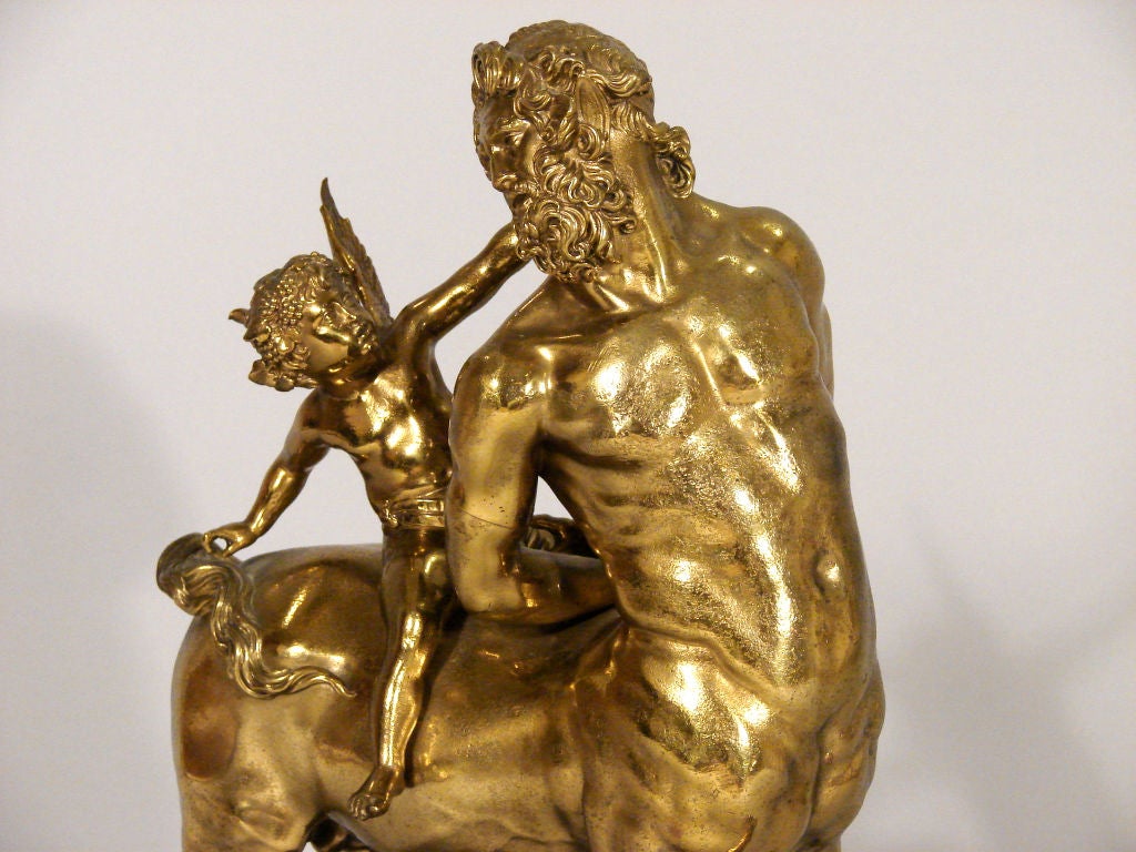 20th Century Brass minotaur with putto on a marble base