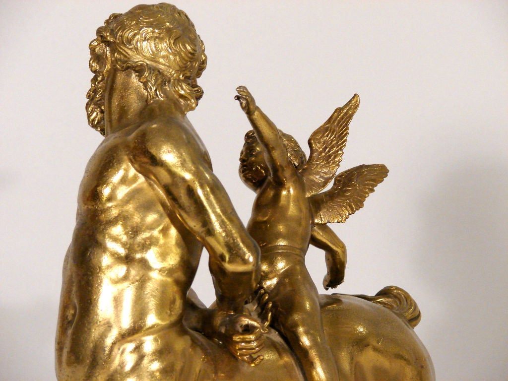 Brass minotaur with putto on a marble base 1