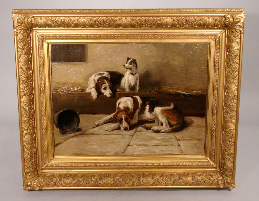 An English oil on canvas depicting 3 recumbent dogs by Lionel Inglis (British 19th century) signed and dated lower right 