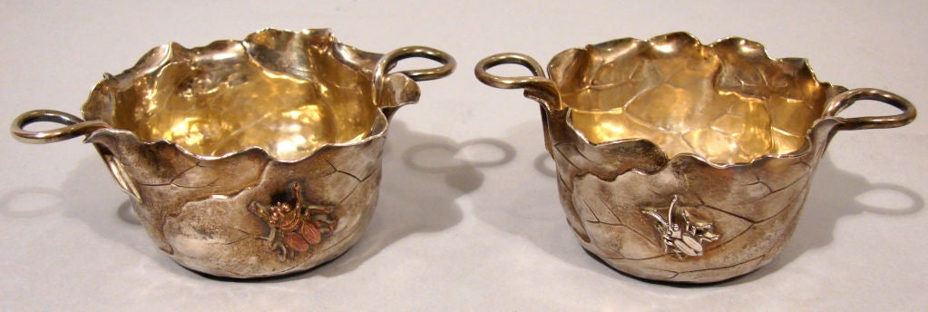 A rare pair of American sterling and mixed metal bowls with gilt washed interiors made and signed by George W. Shiebler & Co., New York. Each bowl has a winged 's' mark over 