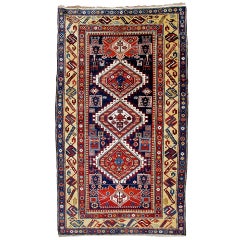 Late 19th Century Indigo Shirvan Long Rug with Red Palmettes