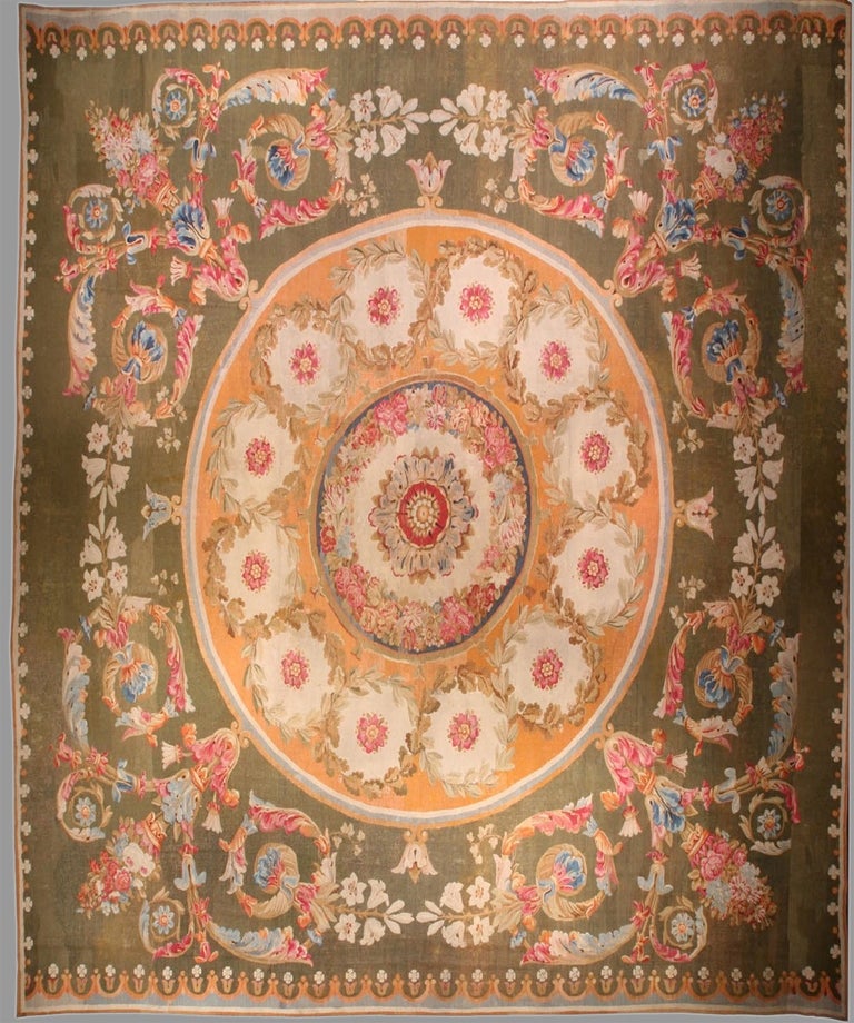 Aubusson Persimmon-Gold Carpet with Green Ground, 19th century, offered by Peter Pap Oriental Rugs Inc.