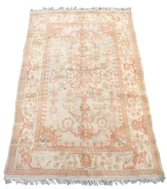 Late 19th Century Ivory Oushak Rug with Rose Highlights