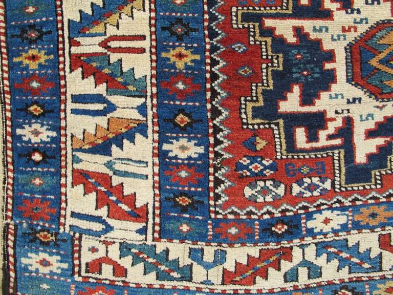 Late 19th Century Varied Red and Blue Lesghi Star Kuba Rug For Sale 2