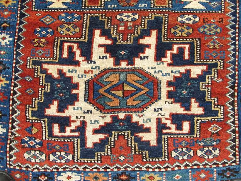 Late 19th Century Varied Red and Blue Lesghi Star Kuba Rug For Sale 1