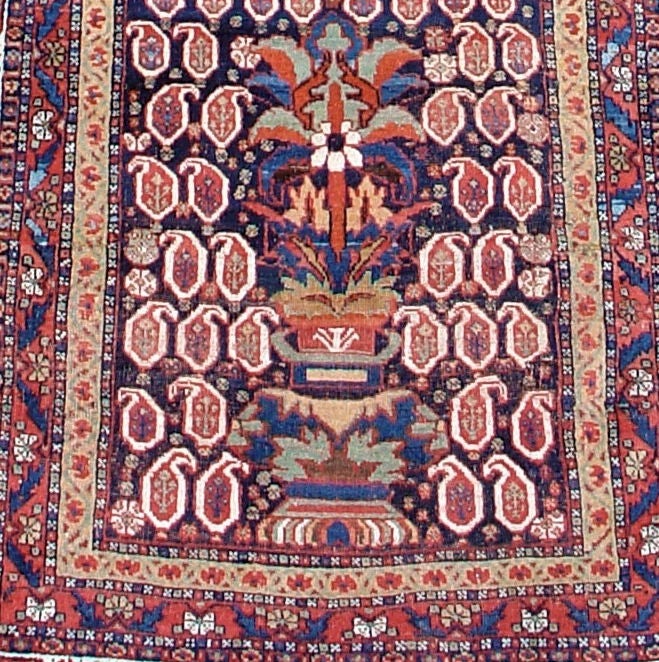 A very unusual combination of designs. Afshar weavers were originally nomadic but transitioned to cottage industry weavers in the late 19th century. You get a wonderful combination of urban design influence with the lingering nomadic motifs,