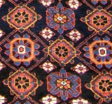 Typical of Veramin rugs this rug has beautifully saturated colors and high quality wool. The Mina-Khani lattice design is a common motif used by the central Persian weavers. The overall pattern of the design is masterfully symmetrical, but the