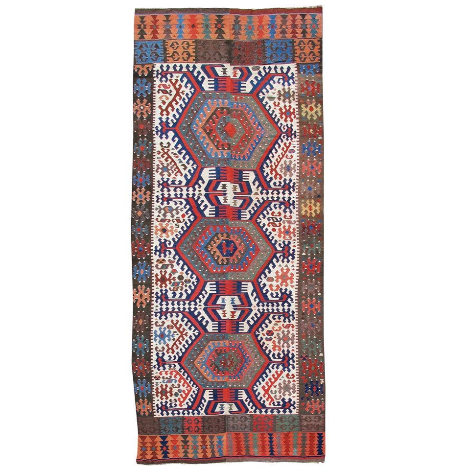 19th Century Turkish Kilim with Blue and Red Medallions For Sale