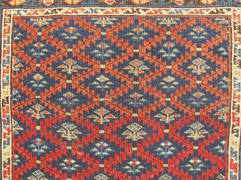 19th Century Blue, Red, and Ivory Caucasian Kuba Rug For Sale 1