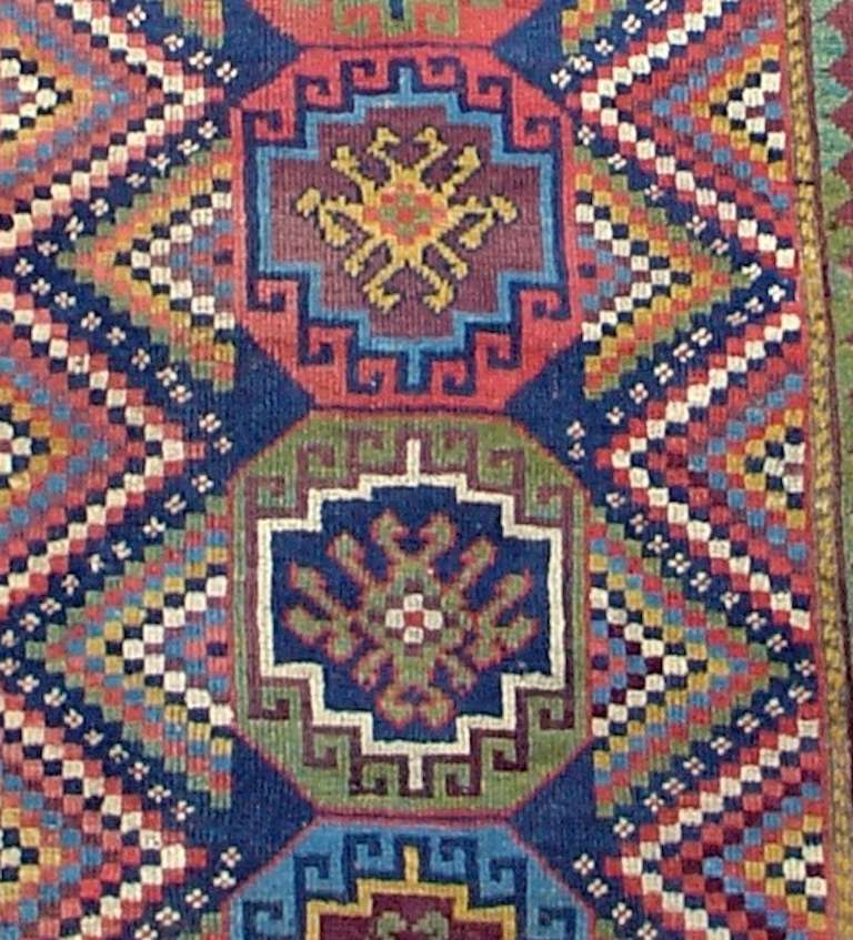 Whether from eastern Anatolia or northwest Persia, the rugs of the Kurds are known for their lush soft wool and rich color choices. This rug has fantastic wool and the color palette including canary yellow, green, rose madder, a variety of blues and