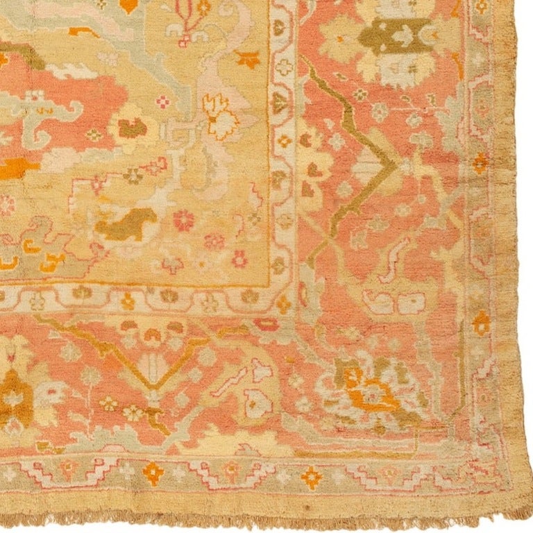 This carpet employs the highest quality soft lustrous wool, a pale palette and spacious drawing for which Classic Oushak carpets from this period are known. The particular all-over pattern using diamond radiating vegetal forms in the field is rare