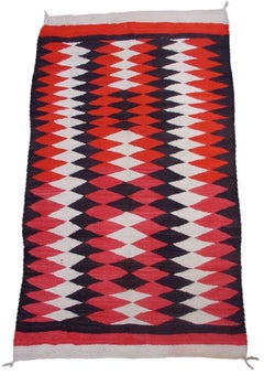 Early 20th Century Red, White, and Brown Navajo Rug