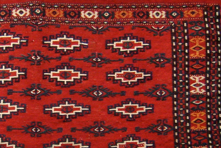 This flat-woven complete tent bag exemplifies the Turkmen love for madder red. Though woven in the early 20th century the spacing of the field elements recalls the proportions of earlier weavings. No synthetic dyes are used in this piece. Of special