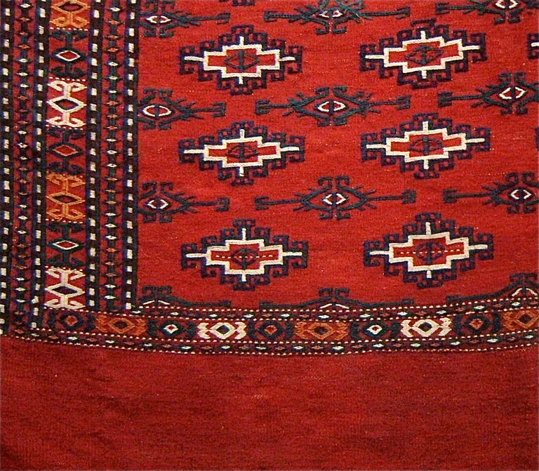 Turkmen Early 20th Century Red Yomut Embroidered Chuval Tent Bag with White Highlights