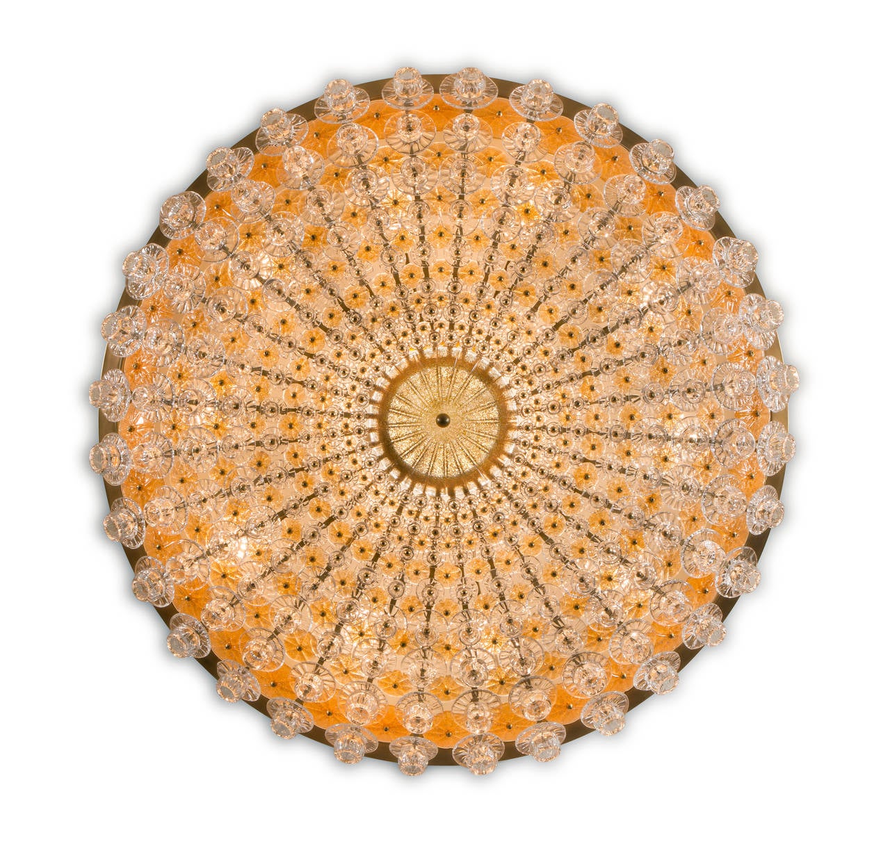 Wildly imaginative and beautifully handcrafted, it can be enjoyed as a spectacular chandelier or wall sconce.

The central circular glass plate, radiating rows of graduated blown glass rosettes over gilt glass medallions, joined to a ring-shaped