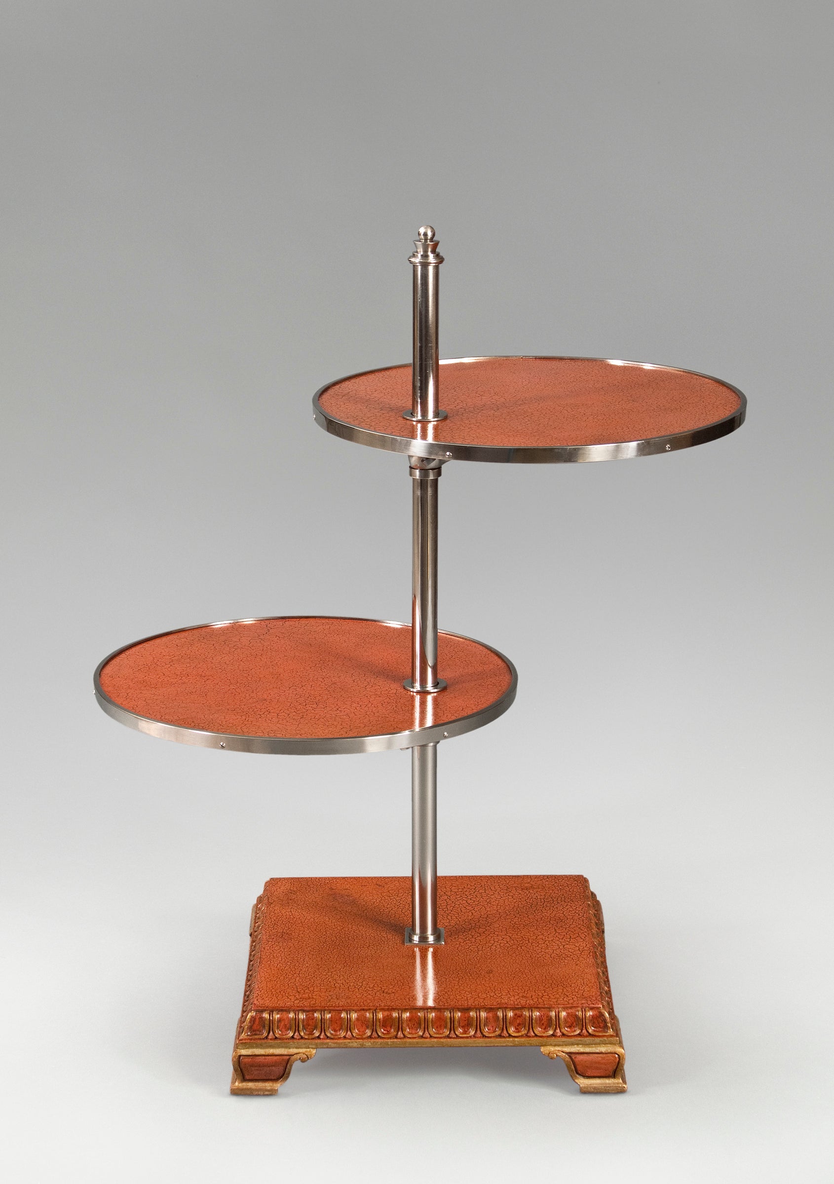 A Nickel, Parcel-Gilt and Crackled Lacquer Adjustable Table by Axel Einar Hjorth