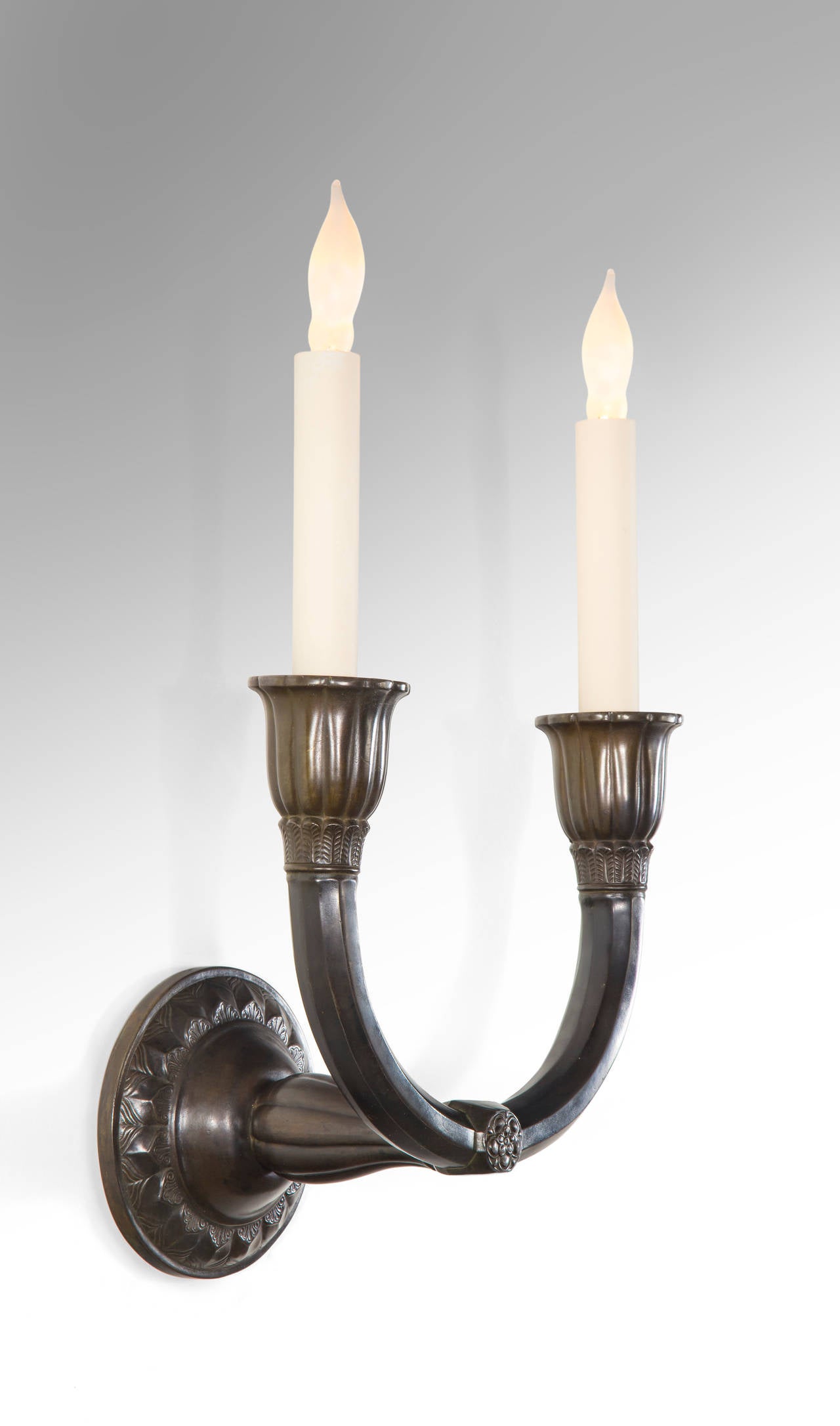 Cast Just Andersen, A Pair of Danish Patinated Disko Metal Sconces