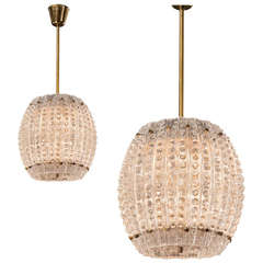 Carl Fagerlund for Orrefors:  A Pair of Brass and Glass Chandeliers