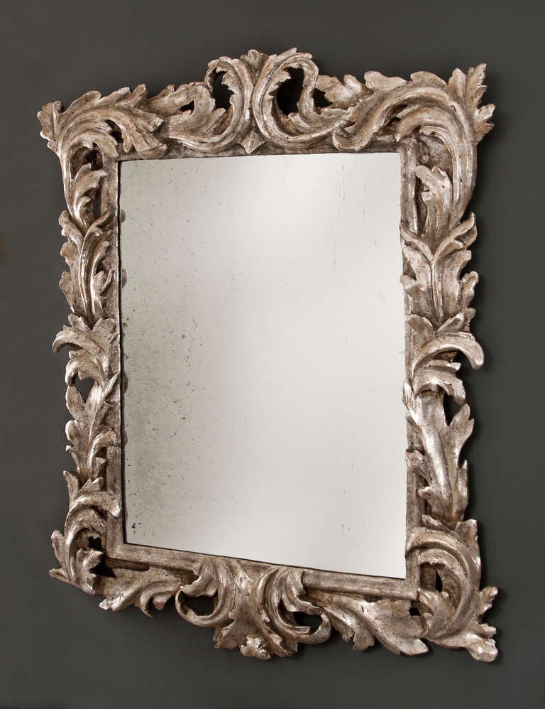 An Italian Baroque Foliate Carved Silvered Wood Mirror In Excellent Condition In New York, NY