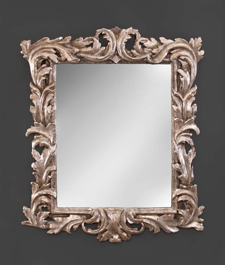The rectangular mirror plate within a molded border, surrounded by exuberant scrolled acanthus leaves.

More mirrors also available at: www.hmluther.com

This piece @ H.M. Luther 
Greenwich Village
61 East 11th Street
New York, NY 10003