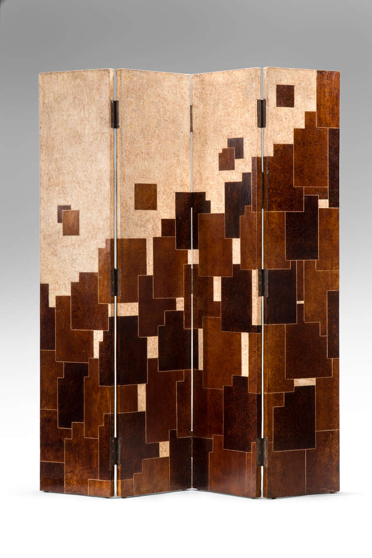 The abstract architectural composition of mottled cream colored stucco and gradient shades of rich brown lacquer arranged in a geometric pattern. Signature incised: Jacques Challou

This piece @ H.M. Luther
Greenwich Village
61 East 11th