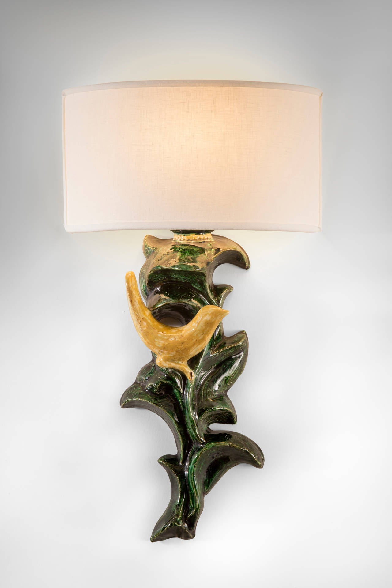 Mid-Century Modern Paul Pouchol, a Pair of French Mirror-Image Faience Sconces