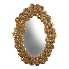 An Austrian Carved and Gilded Wood Oval Mirror
