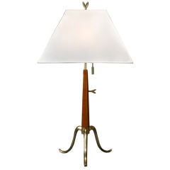 A Brass and Wood Adjustable Lamp