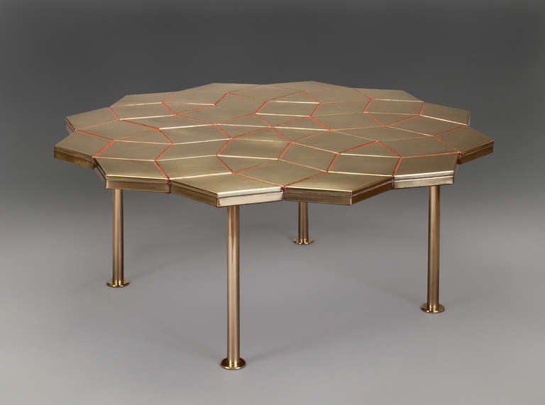 Composed of leaf-like lozenge-shaped sections and resting on four columnar legs with disc feet. A dated drawing of the table from April 18, 1964 signed by Alexander Girard accompanies the piece.

Provenance: Commissioned for 