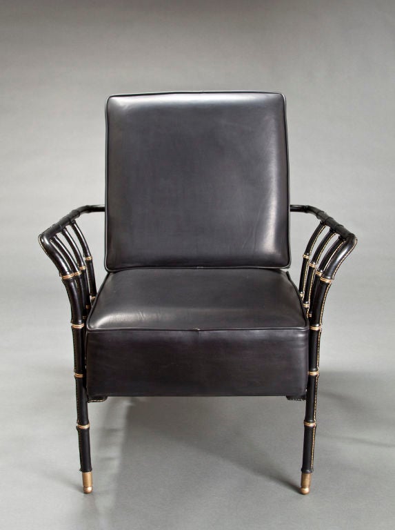 The rectangular upholstered back and seat with wrapped leather faux bamboo arms and legs, terminating with spherical feet.<br />
<br />
These pieces @ H.M. Luther Antiques<br />
Greenwich Village<br />
61 East 11th Street<br />
New York, NY