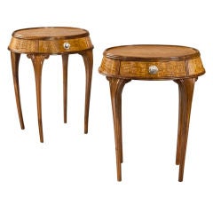 A Pair of Austrian Art Deco Walnut and Figured Ash Oval Tables