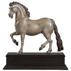 An Italian Painted and Carved Wood Statue of a Horse