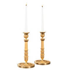 A Pair of French Charles X Gilt Bronze Candlesticks
