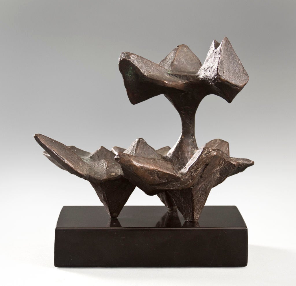 The two-tier abstract form resting on a polished slate base. <br />
<br />
Lin Emery (American, b. 1928) is an artist best known for her monumental kinetic sculptures that reflect organic form and movement. Emery studied under Ossip Zadkine in