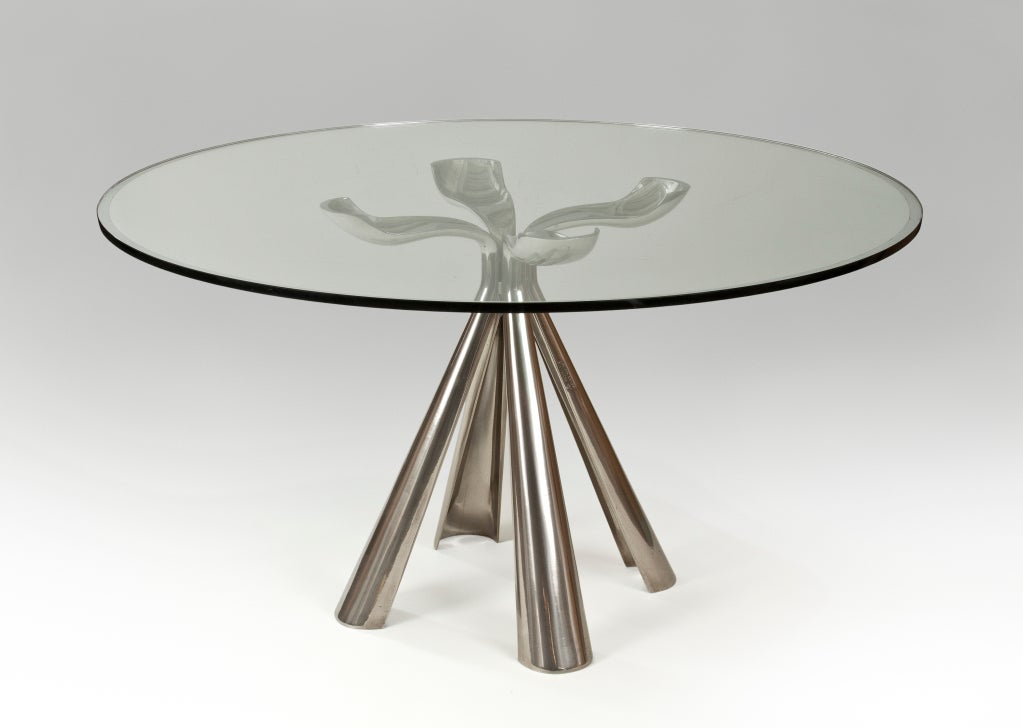 The circular glass top with a silvered ring banding, above a sculptural quatrefoil base.  Signed: Vittorio Introini Saporiti 1 10/72

More tables also available at: www.hmluther.com

This piece @ H.M. Luther Antiques
Greenwich Village
61 East