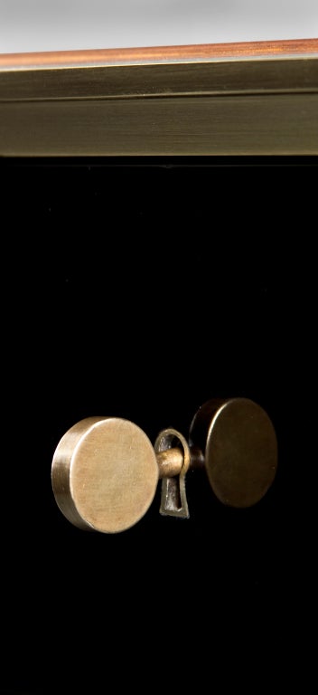 French A Brass, Patinated Leather and Ebonized Desk by Marc du Plantier